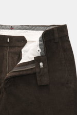Close-up front view of Hiltl Corduroy pants 'Parma' dark brown showing zip fly, waistband hook, soft cotton corduroy with regular fit, slightly tapered, French pockets, and back pockets with button.