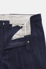 Close-up front view of Brunello Cucinelli Wool Trousers Navy Striped showing open waistband, zipper, button, and soft wool-cashmere fabric with subtle stripes.