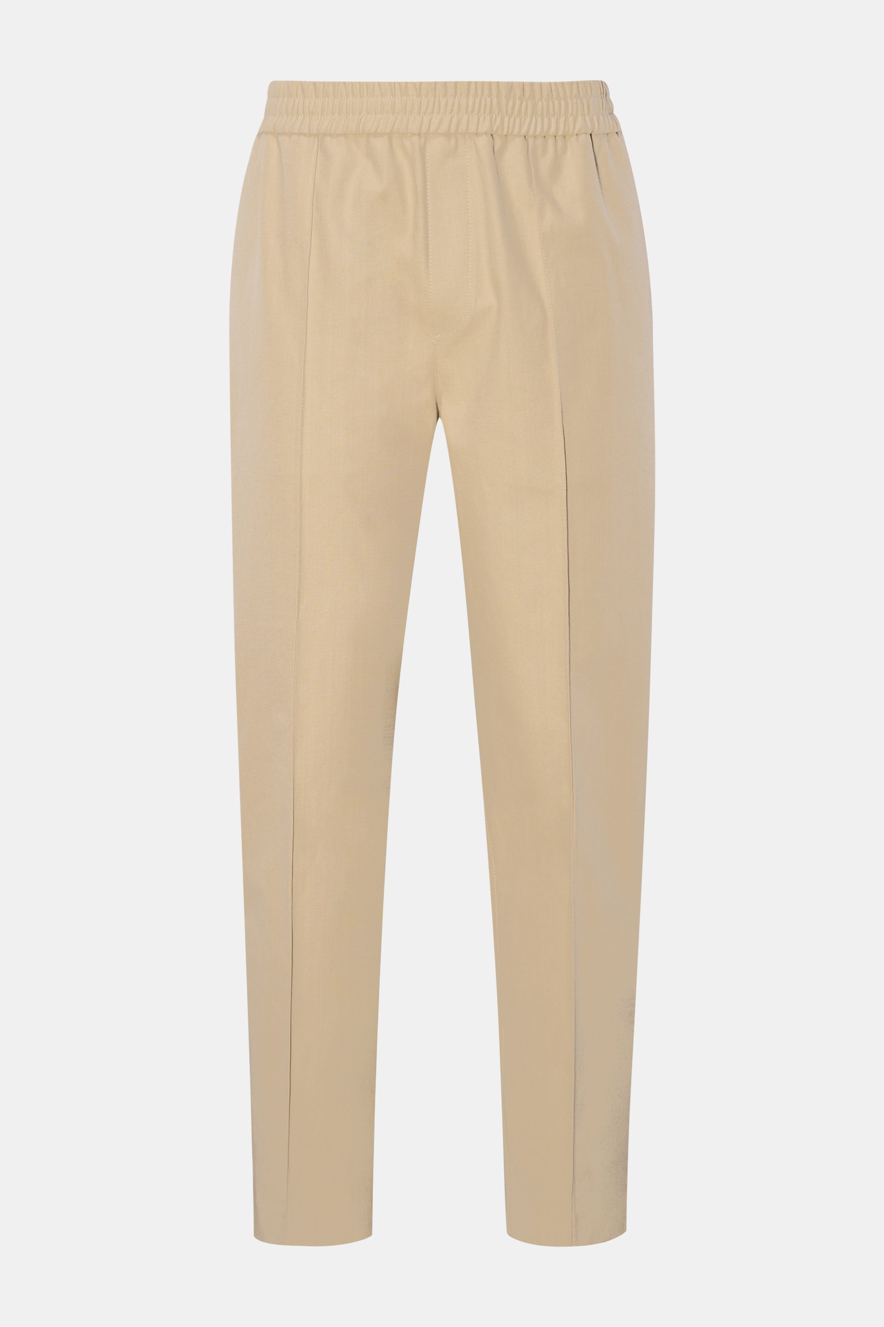 A.P.C. Joggpants 'Pieter' beige aus reiner Baumwolle, Tapered Fit, elastischer Bund, Bügelfalte, knöchellang, Frontansicht.