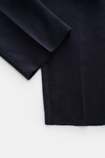Close-up of the hem and lower leg of Doppiaa Trousers 'Aantioco' navy in soft fleece, showcasing fabric texture from a flat lay top-down perspective.

<p>Get a casual, retro look for autumn with these trousers in soft fleece in a fabric blend of modal and