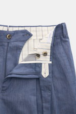 PT Torino Baumwollhose 'Carrot Fit' dunkelblau meliert, nah, offen mit Knopfriegel, Bundfalten, Reißverschluss, Uhrentasche, französischen Taschen, schmal zulaufend.