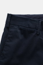 PT Torino Chinos 'Slim Fit' navy cotton twill close-up from front top showing belt loop, zip, and pocket details, soft feel with slight stretch.