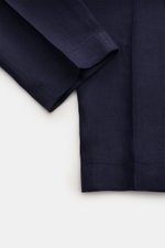 Close-up front view of Berwich Linen trousers 'Chiaia' navy showing herringbone texture and tapered ankle length in pure linen.

<p>The trousers 'Chiaia' in pure linen by BERWICH promise summery lightness – the material’s classic feel and the stylish herr