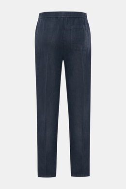Rear view of 04651/ A trip in a bag Leinen-Jogpants 'Linen Pants' navy in pure linen with elastic waistband, tapered fit, French and patch pockets, ankle-length. <p>Perfekt für warme Tage: Die Leinen-Jogpants von 04651/ A TRIP IN A BAG werden zum idealen 