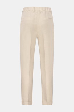 Rear view of 04651/ A trip in a bag Linen jogger pants 'Linen Pants' beige, perfect for warm days with a regular, tapered short cut.

<p>Perfect for warm days: These linen jogger pants by 04651/ A TRIP IN A BAG are the ideal summer essential – for travel 