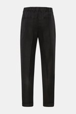 Rear view of 04651/ A trip in a bag Linen jogger pants 'Linen Pants' black, made of pure linen with tapered, short, regular fit.

<p>Perfect for warm days: These linen jogger pants by 04651/ A TRIP IN A BAG are the ideal summer essential – for travel or f