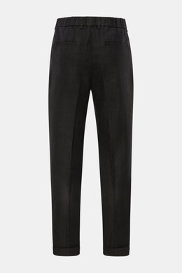Rear view of 04651/ A trip in a bag Linen jogger pants 'Linen Pants' black, made of pure linen with tapered, short, regular fit.

<p>Perfect for warm days: These linen jogger pants by 04651/ A TRIP IN A BAG are the ideal summer essential – for travel or f