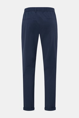 Rear view of 04651/ A trip in a bag Seersucker trousers 'Technical Seersucker' navy, showing tapered fit ankle-length pants made of robust microfibre seersucker fabric, featuring fine typical material texture, regular thigh width, zip and waist button clo