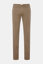 Front view of Jacob Cohen Cotton trousers 'Nick' grey-brown, slim fit five-pocket style with button fly, elasticated cotton, soft feel, tonal stitching, and pony skin look leather patch. Modern luxury for everyday wear – why not? The five-pocket trousers 