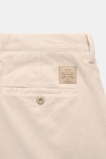 Close-up rear view of Jacob Cohen Corduroy Pants 'Bobby' cream, showing soft cotton blend fabric, back pocket with button, logo patch, and stitching details.