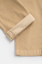Close-up, top-down view of the beige Jacob Cohen Corduroy Pants 'Bobby' showing the corduroy texture and folded cuff, highlighting precise Italian craftsmanship and soft cotton blend fabric with stretch. 

Description: <p>Precise Italian craftsmanship - t