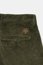Close-up rear view of Jacob Cohen Corduroy Pants 'Bobby' dark green showing soft cotton blend fabric, buttoned back pocket, and logo patch.