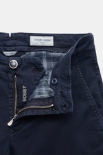 Close-up front view of Jacob Cohen Pants 'Bobby' navy showing zipper, button, and inner plaid lining in soft cotton-lyocell twill with stretch.

Description: <p>Embrace modern luxury in everyday life: The slim-cut pants 'Bobby' from JACOB COHEN impress wi