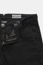 Close-up front view of Jacob Cohen Pants 'Bobby' black, showing twill cotton-lyocell fabric, zipper, waistband button, and label. Opt for modern luxury in everyday life: The slim-cut pants 'Bobby' by JACOB COHEN impress with soft twill made from cotton wi