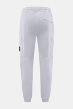 Rear view of Stone Island Cargo Jogpants smoky blue, showing elastic waistband, cargo pockets, and elastic leg cuffs in tapered fit.

Description: <p>For everyone who wants to combine function and style: These cargo jogpants by STONE ISLAND are inspired b