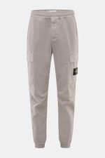 Front view of Stone Island Cargo Jogpants grey in tapered fit with elastic waistband, cargo pockets, and compass badge.

Description: For everyone who wants to combine function and style: These cargo jogpants by STONE ISLAND are inspired by classic utilit