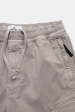 Close-up front view of Stone Island Cargo Jogpants grey showing elastic waistband with drawstring, zip fly, and side pocket detail.  

Description: For everyone who wants to combine function and style: These cargo jogpants by STONE ISLAND are inspired by 