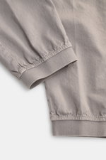 Close-up view of the elastic leg cuff and fabric texture of Stone Island Cargo Jogpants grey, showing soft, garment-dyed organic cotton with a tapered fit.  

Description: For everyone who wants to combine function and style: These cargo jogpants by STONE