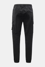 Stone Island Cargo Jogpants black shown from the back, elastic organic cotton with zip fly, cargo pockets, tapered fit, and elastic cuffs.