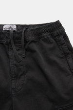 Close-up front view of Stone Island Cargo Jogpants black showing elastic waistband with drawstring, zip fly, and pocket details.  

Description: For everyone who wants to combine function and style: These cargo jogpants by STONE ISLAND are inspired by c
