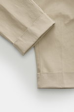 Berwich Cotton Pants 'Chiaia Old' beige shown from above, highlighting the folded cuff and fabric texture, with a modern tapered fit. <p>The 'Chiaia Old' pants by BERWICH impress with a modern tapered fit, elastic cotton, and stylish lines – an expression