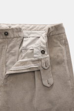 Close-up front view of Berwich Corduroy pants 'Chiaia' taupe with open zipper, button tab, tapered fit, and soft corduroy fabric.