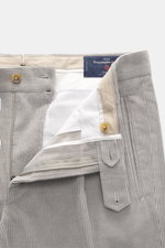 Berwich Corduroy pants 'Retrolong' grey shown from a close-up front angle with waistband open, highlighting corduroy cotton and cashmere fabric, soft feel, regular fit, tapered cut, zipper, waistband buttons, extended button flap, single waistband pleat, 