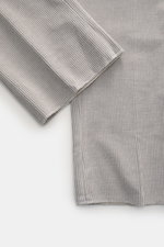 Berwich Corduroy pants 'Retrolong' grey shown from a close-up side angle, highlighting the cotton and cashmere corduroy fabric with a soft feel, regular tapered fit, zipper and waistband buttons, extended button flap, single waistband pleat, piped hip poc