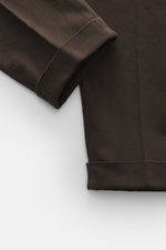 Close-up front view of the Santaniello Chino 'Camerota' dark brown ankle-length pants cuff, showing soft elastic cotton twill and single pleat.

Description: 
<p>Casual meets style: The Chino 'Camerota' by SANTANIELLO impresses with a soft twill made of s