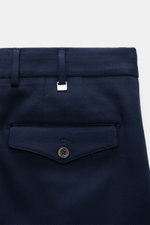 Close-up rear view of PT Torino Cotton trousers 'Carrot Fit' navy, showing twill pure cotton fabric, heavy slightly elastic quality, soft touch, carrot fit with regular thigh width, ankle-length slightly tapered legs, zipper and waistband buttons, extende