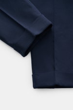 Close-up image of the ankle-length cuff of PT Torino Cotton trousers 'Carrot Fit' navy, showing twill made of pure cotton, heavy, slightly elastic quality, soft touch, carrot fit with regular thigh width, slightly tapered, zipper and waistband buttons, ex