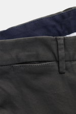 PT Torino Chino 'Slim Fit' dark gray shown from a close-up rear waistband perspective, featuring cotton twill, light stretch, soft touch, zipper and waistband buttons, French pockets, small watch pocket, welted back pockets with button, ideal for versatil
