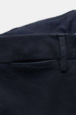 PT Torino Chino 'Slim Fit' navy cotton twill close-up from above showing soft texture, waistband, belt loop, and piped back pocket with button.