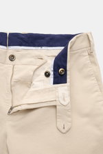 Close-up front view of PT Torino Chino 'Slim Fit' sand featuring zipper, waistband buttons, and navy cotton twill lining.

Description: <p>For this chino, PT TORINO chooses classic cotton twill in a soft quality and adds a slight stretch content for comfo