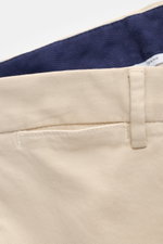PT Torino Chino 'Slim Fit' sand photographed from the back waist, showing soft cotton twill with light stretch, French pockets, watch pocket, and welted buttoned back pockets. For this chino, PT TORINO chooses classic cotton twill in a soft quality and ad