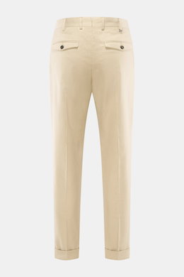 Rear view of PT Torino Pants 'Rebel Fit' beige, ankle-length tapered fit with French pockets, pleated waistband, back flap pockets, and fixed hem cuff.