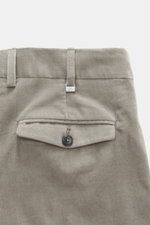 Close-up rear view of PT Torino Corduroy pants 'Rebel Fit' grey, corduroy made of pure cotton, slightly elastic quality, very soft feel, tapered fit, regular thigh width, ankle length, very narrow tapering, zipper and waistband hook, single waistband plea