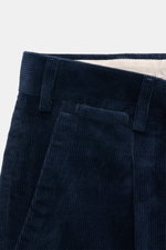 Close-up front view of PT Torino Corduroy pants 'Rebel Fit' navy, corduroy made of pure cotton, slightly elastic quality, very soft feel, tapered fit, regular thigh width, ankle length, very narrow tapering, zipper and waistband hook, single waistband ple
