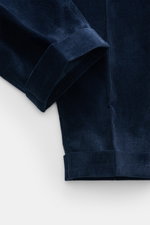 Close-up image of the ankle hem cuff of PT Torino Corduroy pants 'Rebel Fit' navy, showing corduroy made of pure cotton, slightly elastic quality, very soft feel, tapered fit, regular thigh width, ankle length, very narrow tapering, zipper and waistband h