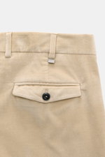 PT Torino Corduroy pants 'Rebel Fit' beige shown from the rear upper section, corduroy made of pure cotton, slightly elastic quality, very soft feel, tapered fit, regular thigh width, ankle length, very narrow tapering, zipper and waistband hook, single w
