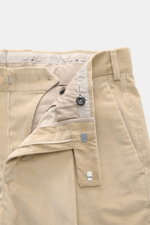 Close-up front view of PT Torino Corduroy pants 'Rebel Fit' beige showing zipper, waistband hook, single pleat, corduroy pure cotton, soft feel, slightly elastic, tapered fit, regular thigh width, ankle length, very narrow tapering, small watch pocket, Fr