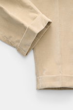 Close-up front view of PT Torino Corduroy pants 'Rebel Fit' beige, showing pure cotton corduroy fabric with slightly elastic, very soft feel, tapered fit, regular thigh width, ankle length, very narrow tapering, zipper and waistband hook, single waistband