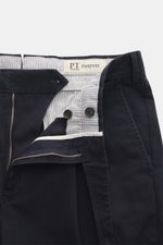Close-up front view of PT Torino Chino 'Hamptons' navy showing twill pure cotton fabric, soft touch, tapered fit, zipper, waistband buttons, extended button tab, and small watch pocket.
