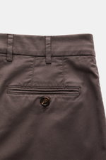 Close-up rear view of Brunello Cucinelli Chinos 'Italian Fit' grey brown showing garment-dyed twill, tapered cut, buttoned back pocket, and belt loops.