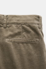 Brunello Cucinelli Corduroy pants sage shown from close-up rear view, highlighting pure cotton fabric, single pleat, French and welt pockets.