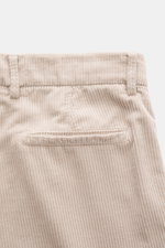 Close-up rear view of Brunello Cucinelli Beige Corduroy Pants showcasing pure cotton fabric, soft touch, garment dyed, regular fit, slim tapering, belt loops, and welt pockets. Corduroy can also be elegant – these pants with classic pleats present the for