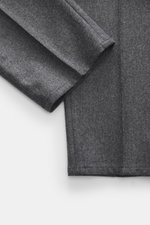 Close-up front view of Brunello Cucinelli wool trousers dark grey melange showing fabric texture and hem detail.

Description: <p>These wool trousers of the luxury label BRUNELLO CUCINELLI are a true classic among trouser models with their pleated front a