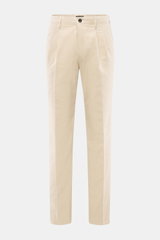 Front view of Incotex Cotton trousers sand in a soft, brushed sand twill made of slightly elastic cotton, tapered fit with narrow tapering, zipper and waistband button, double waistband pleat, french pockets, back pockets with button, and tonal logo stitc