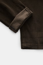 Close-up top view of Mason's Corduroy Pants 'Torino Style' grey brown showing soft, garment-dyed cotton-lyocell fabric with stretch and fine ribbed texture.