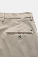 Close-up rear view of Mason's Chino 'Torinostyle' grey showing soft-touch fabric with a mix of modal, cotton, microfiber, slim and tapered fit, zipper and waistband buttons, French pockets, piped back pockets with button, and typical metal initial.